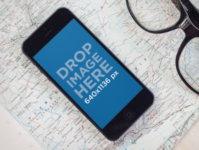 Black iPhone 5 Over A Map