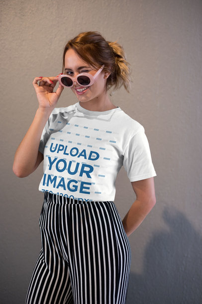 Tee Mockup of a Woman with Cool Sunglasses Winking