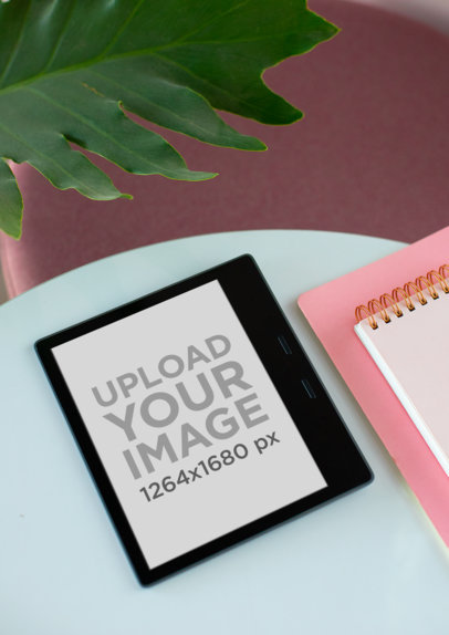 Mockup of a Kindle Oasis Lying over a Small Stool