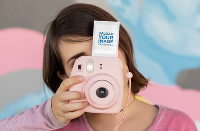 Instax Frame Mockup of a Woman Holding an Instant Camera