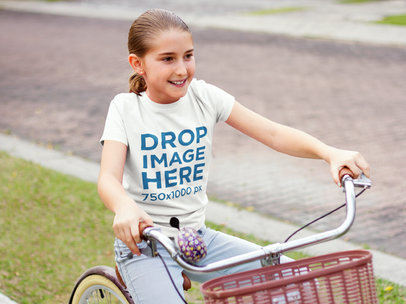Girl Learning How to Ride a Bicycle T-Shirt Mockup