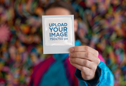 Polaroid Frame Mockup of a Woman Showing Off Her Instant Picture
