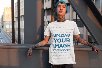 Tee Mockup of an Edgy Man with a Neck Tattoo