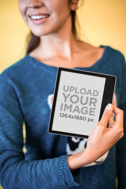 Mockup of a Woman Carrying Her Kindle Oasis