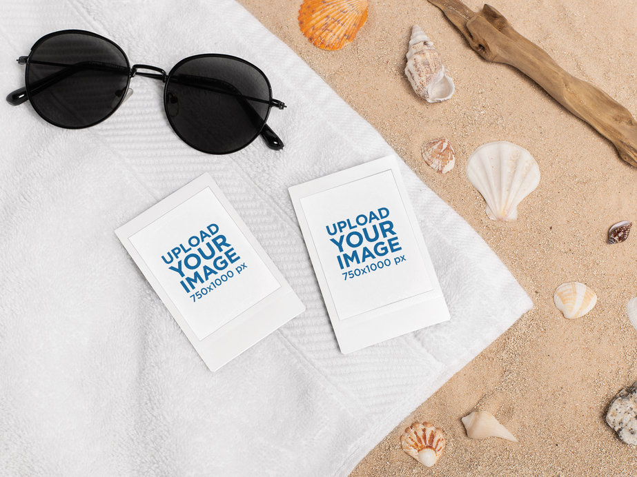 Mockup of Two Polaroid Picture Frames over a Towel at the Beach