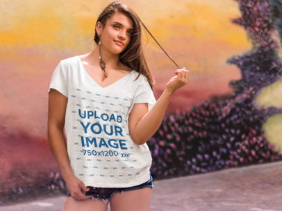 Woman Standing in Front of a Mural T-Shirt Mockup