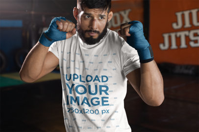 T-Shirt Mockup of an MMA Athlete Preparing for Sparring