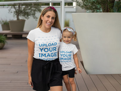 Mockup of a Joyful Mom Next to Her Daughter Having Fun 