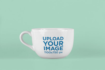 Mockup of a Large Coffee Mug with a Colored Backdrop 26466