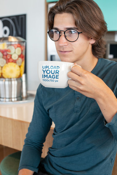 Coffee Mug Mockup of a Young Man with Glasses by a Juice Bar 26502