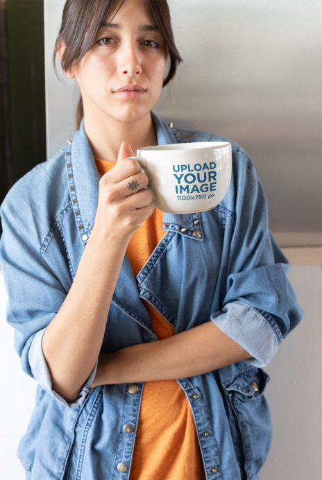 Mockup of a Woman Relaxing with a Big Cup of Coffee