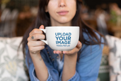 Mockup of a Woman Offering a Big Cup of Coffee 26456