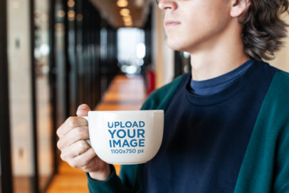 Coffee Mug Mockup of a Young Man in a Hallway 26511