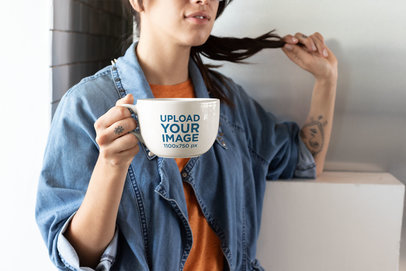 Coffee Mug Mockup of a Tattooed Girl in a Denim Jacket Twisting Her Hair 26457