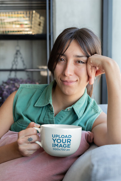 Mockup of a Kind-Looking Woman Holding a Big Cup of Coffee 26458