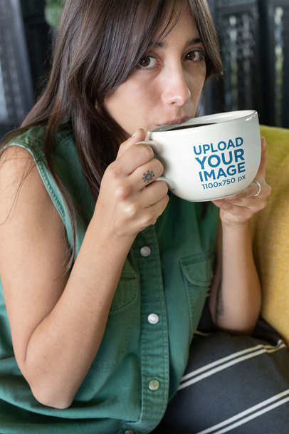 Mockup of a Dark-Haired Girl Drinking from a Big Coffee Mug 26461
