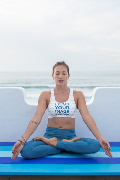 Mockup of a Meditating Woman in Sports Bra and Leggings 
