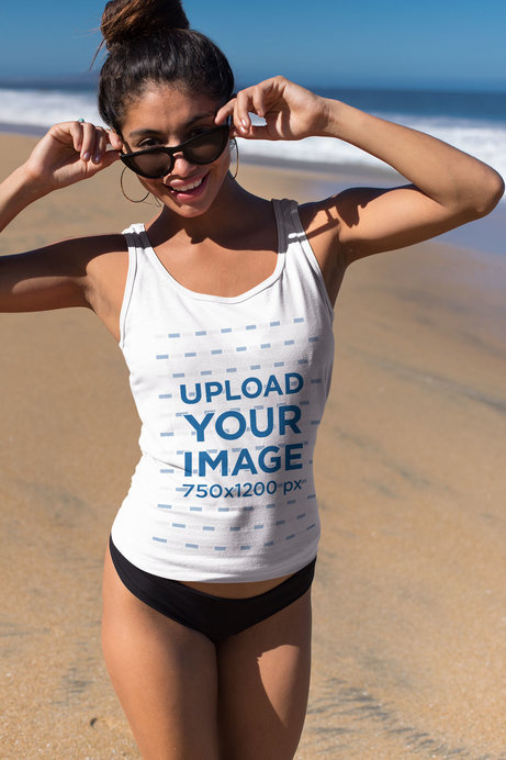 Tank Top Mockup of a Woman with Trendy Sunglasses at the Beach