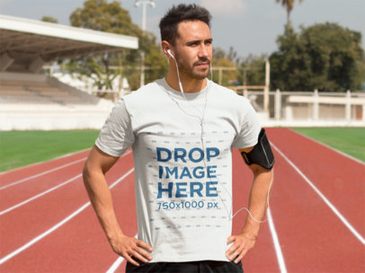 Athletic Man Exercising on a Track Field T-Shirt Mockup