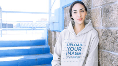 Pullover Hoodie Video Featuring a Smiling Woman in a Stadium