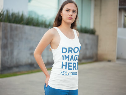 Young Woman Standing Outside her Home Tank Top Mockup