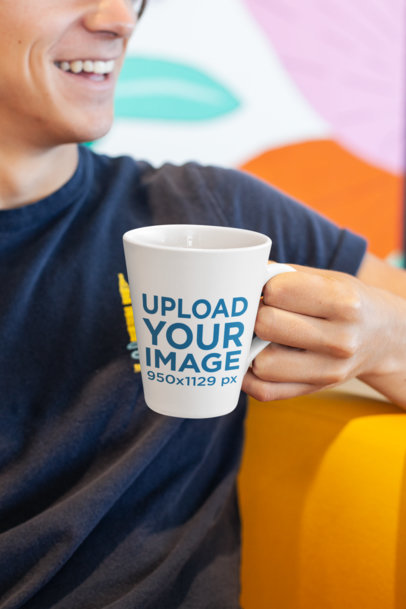 11 oz Coffee Mug Mockup of a Smiling Man in a Colorful Setting