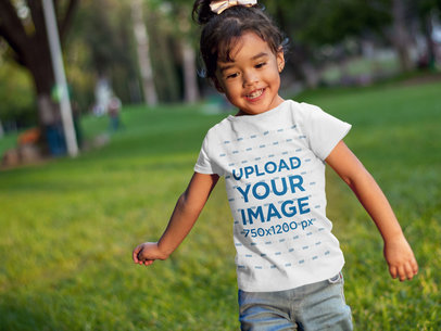 Little Girl Running at a Park T-Shirt Mockup