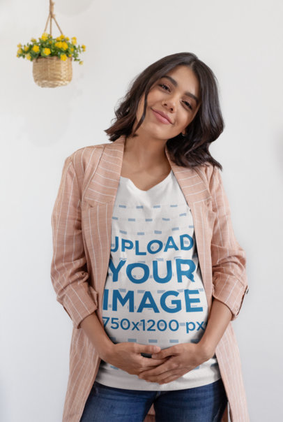 Mockup of a Happy Woman Wearing a Pregnancy T-Shirt