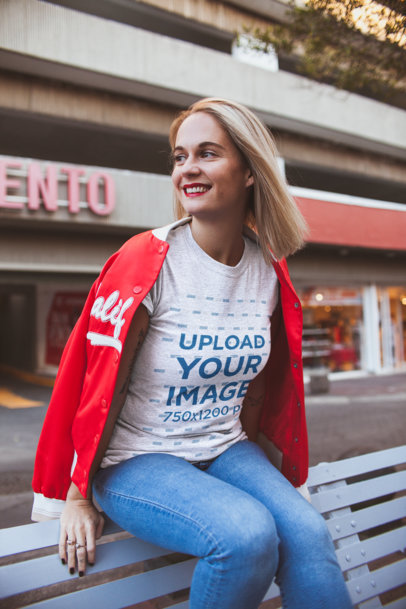 T-Shirt Mockup of a Blonde Woman in a Commercial City Area 23956