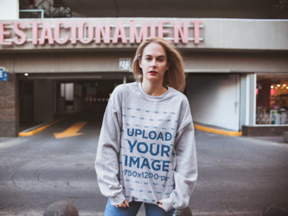Mockup of a Blonde Woman Wearing a Heather Sweatshirt 