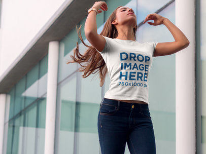 Woman Standing by a Modern Office Building T-Shirt Mockup