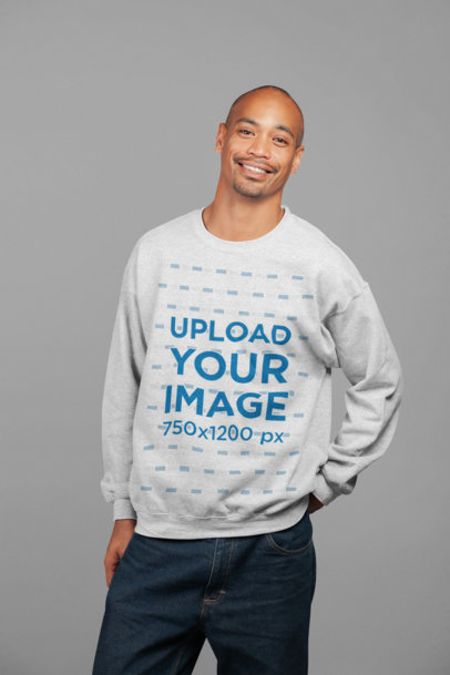 Mockup of a Friendly Man Wearing a Heather Sweatshirt at a Studio