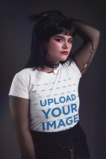 Mockup of a Goth Woman Modeling a T-Shirt in a Studio