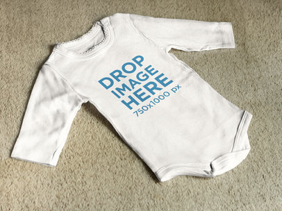 Baby Outfit Lying on a Carpet Clothing Mockup a7958