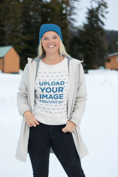 Sweatshirt Mockup of a Blonde Woman Wearing a Coat at a Snowy Mountain 25081