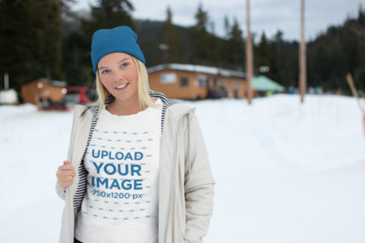 Sweatshirt Mockup of a Woman Wearing a Coat in the Snow 25082