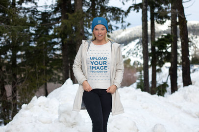 Crewneck Sweatshirt Mockup Featuring a Woman on a Snowy Day