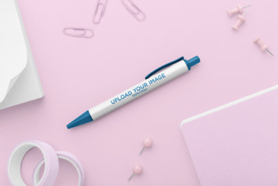 Mockup of a Pen Surrounded by Office Supplies 23530