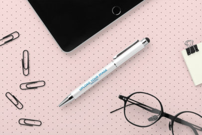 Mockup of a Metallic Color Pen Surrounded by Office Supplies 23531