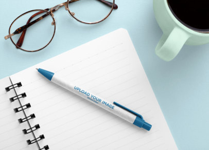 Mockup of an Eco-Friendly Pen on a Notepad 23532