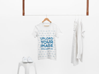 Mockup of a T-Shirt Hanging With Only White Clothes 