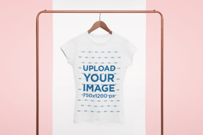 Mockup of a Women's Crewneck Tee Hanging from a Rack