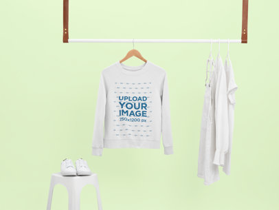 Mockup of a Crewneck Sweater on a Minimalist Hanging Rod