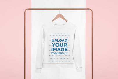 Mockup of a Crewneck Sweatshirt Hanging from a Cooper Tube 27006