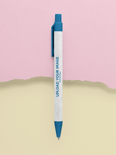 Mockup of an Eco-Friendly Pen over Two Torn Pasteboards 23535