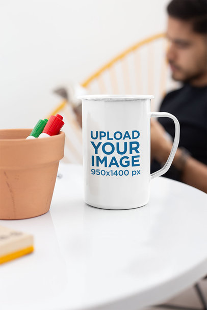 21 Oz Enamel Mug Mockup over a White Table 26931