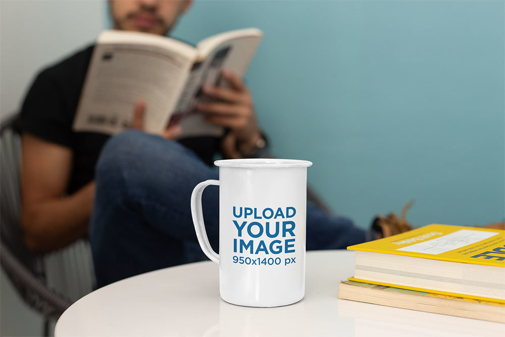 21 oz Enamel Mockup Featuring a Man Reading in the Back