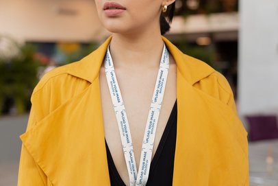 Lanyard Mockup of a Woman in a Yellow Trench Coat