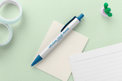 Pen Mockup over Paper Sheets and Office Supplies 23578