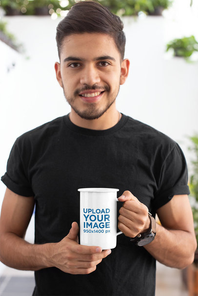 Mockup of a Smiling Bearded Man Holding a 21 Oz Enamel Coffee Mug 26935